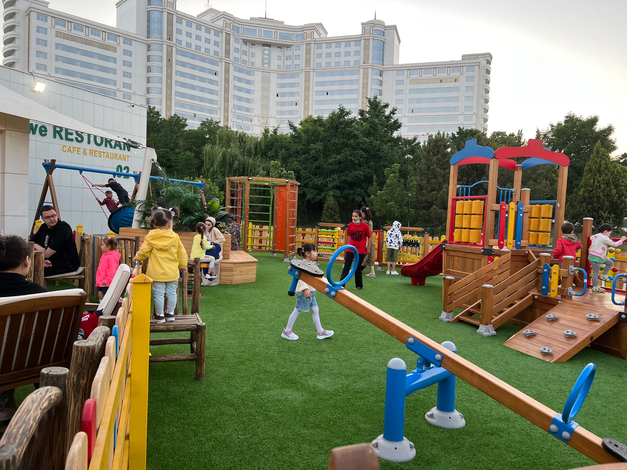 An amazing playground · Slides, swings and room for little adventures. Make it a family day at Alp Et.